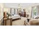 Spacious primary bedroom with neutral tones, recessed lighting, and large windows at 12 Jerry Ct., Pawleys Island, SC 29585