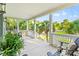 Relaxing outdoor porch area with comfortable seating and scenic views of the surrounding neighborhood at 12 Jerry Ct., Pawleys Island, SC 29585