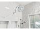 Detailed close-up of the dual shower head and herringbone tile in the shower at 12 Jerry Ct., Pawleys Island, SC 29585