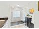 Luxurious shower with rainfall showerhead, mosaic tile, and built-in bench at 12 Jerry Ct., Pawleys Island, SC 29585