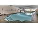 Spacious indoor pool with easy access steps and ample space for swimming at 1210 N Waccamaw Dr. # 602, Murrells Inlet, SC 29576