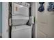 Convenient laundry room with stacked washer and dryer at 1210 N Waccamaw Dr. # 602, Murrells Inlet, SC 29576