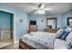 Comfortable main bedroom features a queen-size bed, dresser, and TV at 1210 N Waccamaw Dr. # 602, Murrells Inlet, SC 29576