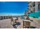 Charming patio area offering relaxing seating with coastal views near the building at 1210 N Waccamaw Dr. # 602, Murrells Inlet, SC 29576