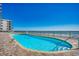 Bright outdoor community pool offering refreshing relaxation with ocean views at 1210 N Waccamaw Dr. # 602, Murrells Inlet, SC 29576