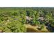 A tranquil home overlooking a serene pond, surrounded by lush greenery and mature trees at 1221 Tidewater Dr. # 2112, North Myrtle Beach, SC 29582