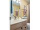 Bathroom featuring a vanity with sink, mirror, toilet, and shower with tan curtain at 1221 Tidewater Dr. # 2112, North Myrtle Beach, SC 29582