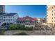A relaxing outdoor seating area is visible from this beautiful beachside property at 1221 Tidewater Dr. # 2112, North Myrtle Beach, SC 29582
