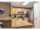 Well-equipped kitchen with granite countertops and stainless steel appliances at 1221 Tidewater Dr. # 2112, North Myrtle Beach, SC 29582