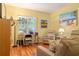 Cozy den with wood floors, beachy artwork, and comfortable seating at 1221 Tidewater Dr. # 2112, North Myrtle Beach, SC 29582