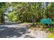 Welcoming Teal Lake Village entrance with lush landscaping and clear signage at 1221 Tidewater Dr. # 2112, North Myrtle Beach, SC 29582