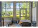 The sunroom offers views of the pond and backyard at 1221 Tidewater Dr. # 2112, North Myrtle Beach, SC 29582