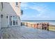A spacious tiled balcony overlooks the beach and ocean, offering stunning views and direct access via a boardwalk at 123 Pioneer Loop, Georgetown, SC 29440