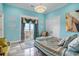Bedroom with ocean view, private balcony access and luxurious accents, offers an inviting and relaxing retreat at 123 Pioneer Loop, Georgetown, SC 29440