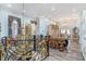 Grand foyer featuring ornate gold accents on the railing, cabinetry, and trim showcases the home's luxurious design at 123 Pioneer Loop, Georgetown, SC 29440
