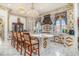 A spacious kitchen features a large island, elegant decor, and high-end appliances at 123 Pioneer Loop, Georgetown, SC 29440