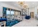 Opulent living room boasts ocean views, custom wall details, and elegant furnishings creates an inviting and luxurious space at 123 Pioneer Loop, Georgetown, SC 29440