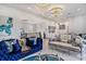 Elegant living room with designer furniture, marble floors, and detailed trim provides a luxurious space for relaxation and entertainment at 123 Pioneer Loop, Georgetown, SC 29440