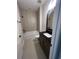 This bathroom features a combination tub and shower and tiled walls at 1248 Lady Bird Way, North Myrtle Beach, SC 29582
