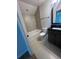 A bathroom with a vanity and black countertop, including a combination tub and shower at 1248 Lady Bird Way, North Myrtle Beach, SC 29582