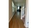 Inviting entryway features attractive wood flooring and leads to an open-concept living space at 1248 Lady Bird Way, North Myrtle Beach, SC 29582
