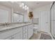 Bathroom featuring double sinks with granite counters, and a glass-enclosed shower at 132 Machrie Loop # A, Myrtle Beach, SC 29588
