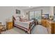 Comfortable bedroom with carpet floors, ceiling fan, and two nightstands at 132 Machrie Loop # A, Myrtle Beach, SC 29588