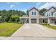 Charming two-story townhome featuring a well-manicured lawn and a private garage at 132 Machrie Loop # A, Myrtle Beach, SC 29588