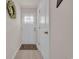 Clean hallway with a neutral palette, hardwood flooring, and interior doors at 132 Machrie Loop # A, Myrtle Beach, SC 29588