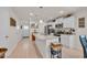 Bright, modern kitchen with a large island, stainless steel appliances, and white cabinetry at 132 Machrie Loop # A, Myrtle Beach, SC 29588