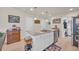 Open kitchen with a large center island, stainless steel sink, and ample storage space at 132 Machrie Loop # A, Myrtle Beach, SC 29588