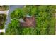 An aerial view showcases the house nestled among the trees at 1325 Clipper Dr., North Myrtle Beach, SC 29582
