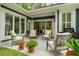 Outdoor seating arrangement featuring a grill with a sliding glass door to the house at 1325 Clipper Dr., North Myrtle Beach, SC 29582