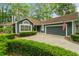 Lovely blue home with a two-car garage and well-manicured landscaping at 1325 Clipper Dr., North Myrtle Beach, SC 29582