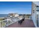 Relax on this balcony with ocean views and seating, perfect for enjoying the coastal breeze at 139 Pioneer Loop, Georgetown, SC 29440