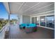 Inviting covered deck with comfortable seating offering beautiful views of the surroundings at 139 Pioneer Loop, Georgetown, SC 29440