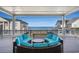 Expansive deck boasts ocean views and comfortable outdoor seating, perfect for entertaining at 139 Pioneer Loop, Georgetown, SC 29440