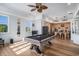 Entertain in the game room, featuring a pool table, wet bar, and stylish wood accents at 139 Pioneer Loop, Georgetown, SC 29440