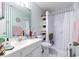 Neat bathroom featuring shower, sink, and organized storage at 1437 Baldwin Ct. # 1437, Little River, SC 29566