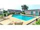 Inviting community pool surrounded by lounge chairs and well-maintained landscaping at 1437 Baldwin Ct. # 1437, Little River, SC 29566