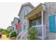 Charming townhome exterior with brick facade, white railing and American flag at 1437 Baldwin Ct. # 1437, Little River, SC 29566