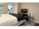 Comfortable main bedroom with a king-sized bed, TV, and neutral color scheme at 1501 S Ocean Blvd. # 239, Myrtle Beach, SC 29577