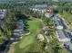 Aerial view of property with golf course nearby and property marker placed on building at 1505 Lantern Rest Dr. # 301, Myrtle Beach, SC 29579
