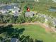 Aerial view of home with golf course nearby, with a pin marking the exact building location at 1505 Lantern Rest Dr. # 301, Myrtle Beach, SC 29579