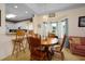 Cozy dining area featuring wood furniture, carpeted floor, and lots of natural light at 1505 Lantern Rest Dr. # 301, Myrtle Beach, SC 29579