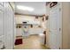 Traditional kitchen with white cabinets, tiled floor, and white appliances at 1505 Lantern Rest Dr. # 301, Myrtle Beach, SC 29579