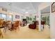 Spacious living room featuring a ceiling fan, ample natural light, and carpeted floors at 1505 Lantern Rest Dr. # 301, Myrtle Beach, SC 29579