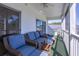Relaxing screened-in porch with comfortable seating, a ceiling fan, and golf course view at 1505 Lantern Rest Dr. # 301, Myrtle Beach, SC 29579