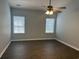 Bright bedroom with hardwood floors and modern ceiling fan at 152 Rose Water Loop, Myrtle Beach, SC 29588