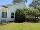 Exterior view of a well-maintained home with manicured landscaping at 152 Rose Water Loop, Myrtle Beach, SC 29588